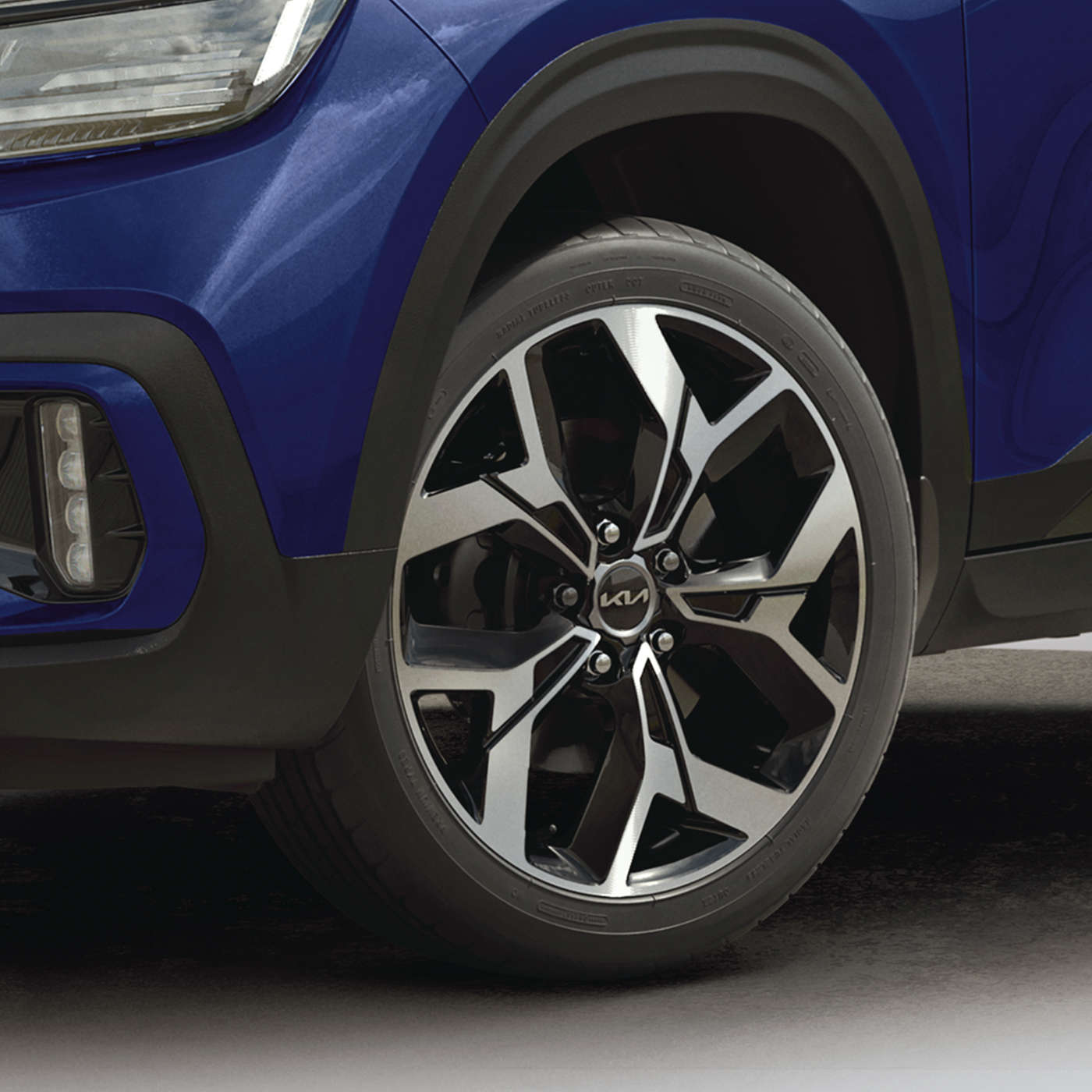 2023 Kia EV6 Accelerating On A Narrow Road Front View